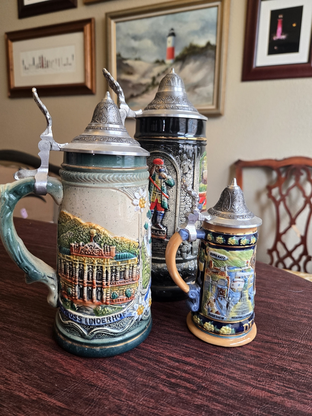 Three German Beer Steins - Multi-Color Ceramic with Pewter Lids